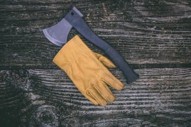 an axe and garden glove